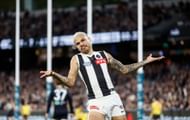 Bobby Hill of the Magpies celebrates a goal during the 2024 AFL round eight match between the Carlton Blues and the Collingwood Magpies